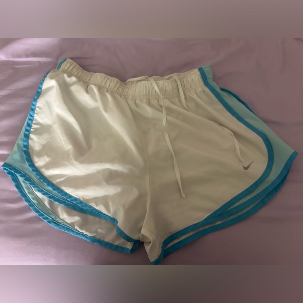 White and blue Nike shorts